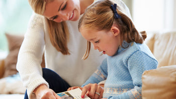 mother reading with daughter