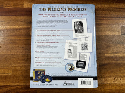 Back cover of a book titled 'The Pilgrim's Progress' on a wooden surface