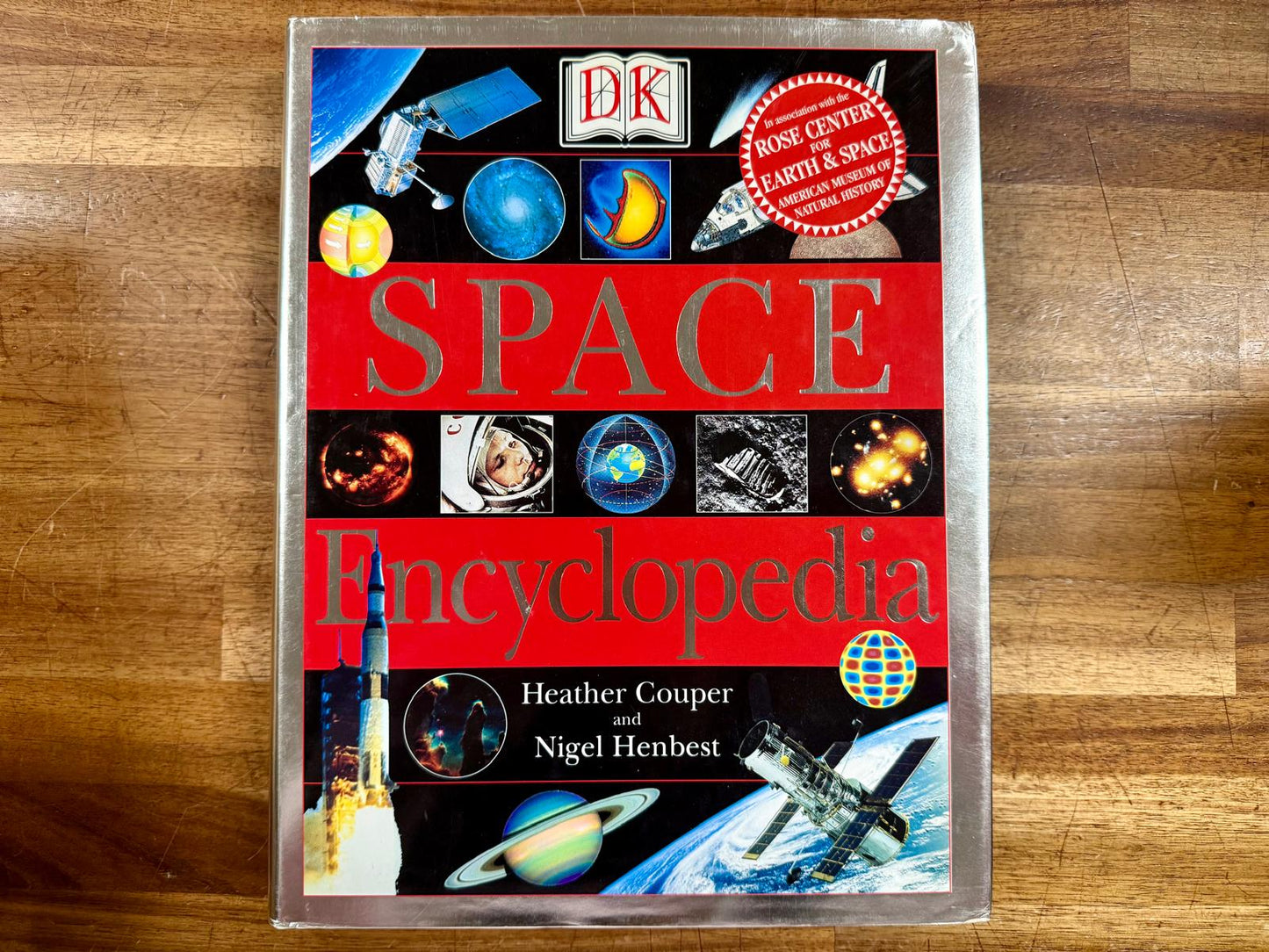 DK Space Encyclopedia Hardcover by Couper & Henbest