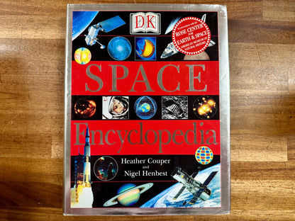 DK Space Encyclopedia Hardcover by Couper & Henbest