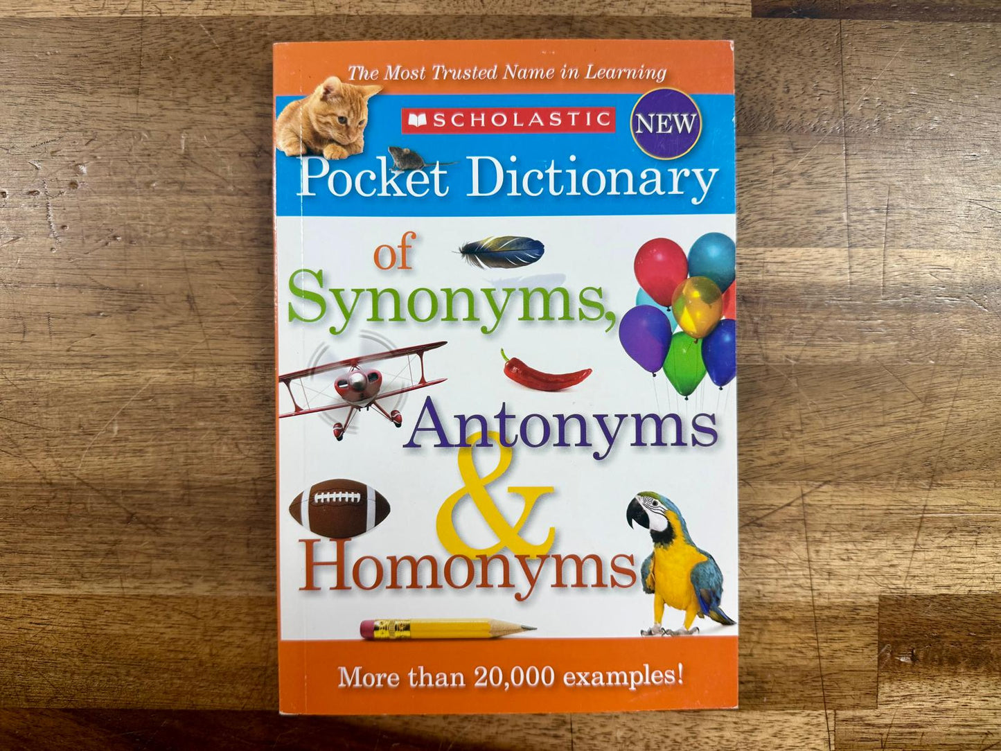 Scholastic Pocket Dictionary of Synonyms, Antonyms, & Hon...