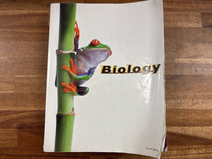 BJU Press Biology Fourth Edition Student Textbook — Acceptable — Item #268078 | Noticeable cover wear with a torn/damaged corner and some edge fraying; no writing inside visible. Highlighting on a few pages.