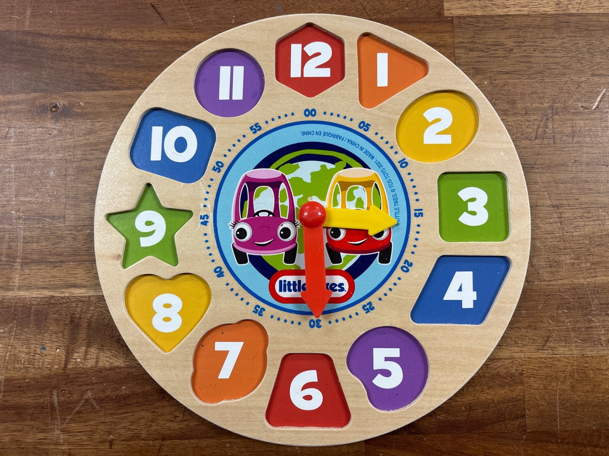 Little Tikes Wooden Shape Sorting Clock Puzzle Toy — front cover