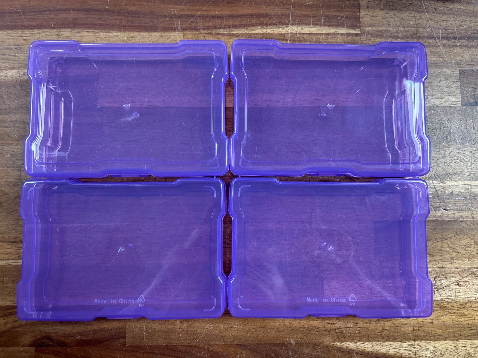 Purple Plastic Storage Cases - Set of 4 Small Boxes — front cover