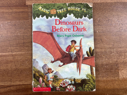 Magic Tree House #1 Dinosaurs Before Dark Paperback — front cover