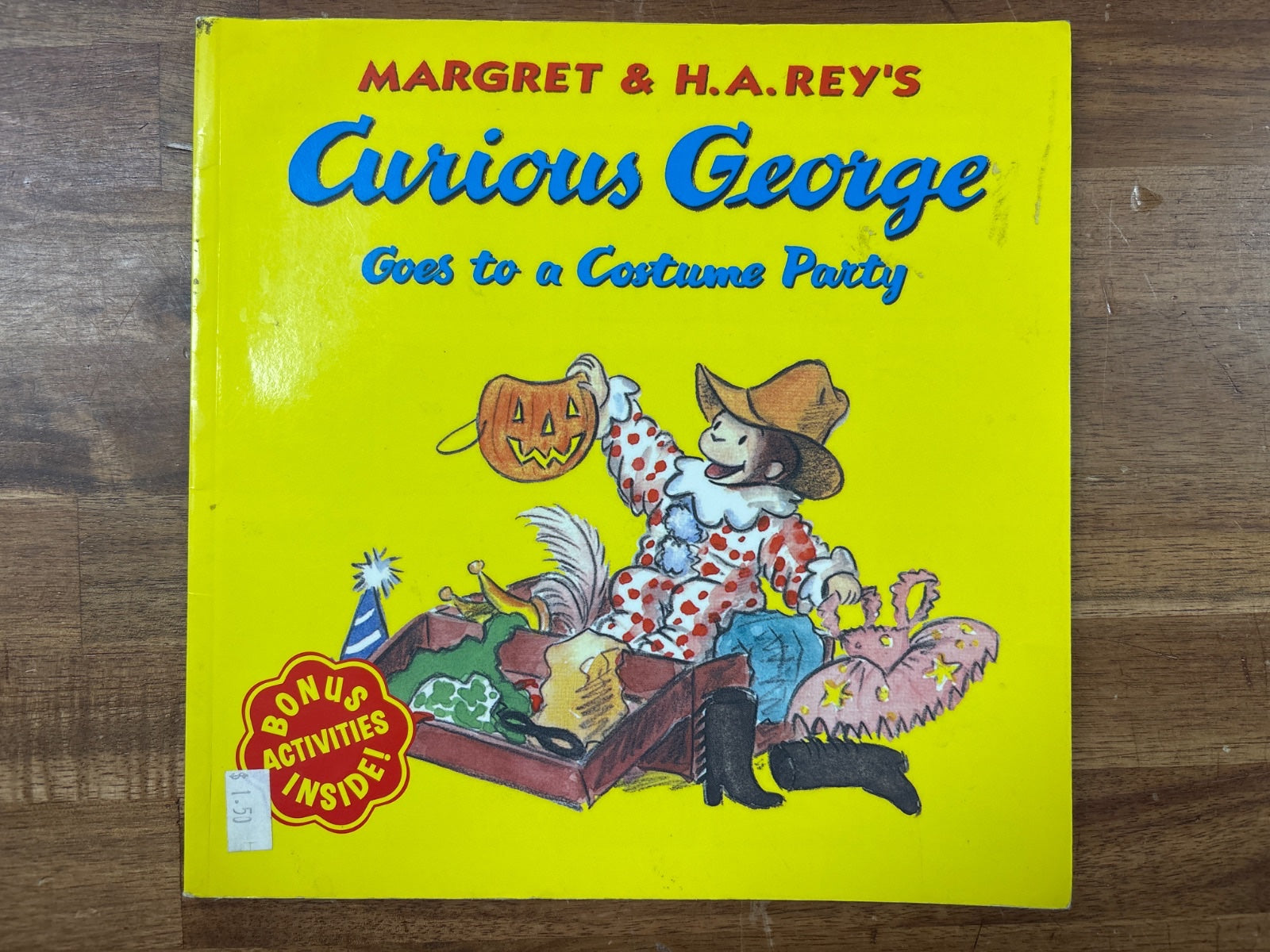 Curious George Goes to a Costume Party by Margret & H.A. Rey — front cover