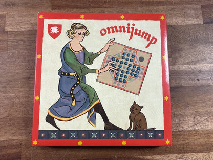 Omnijump Six-in-One Marble Solitaire Game - Curiosity Box — front cover