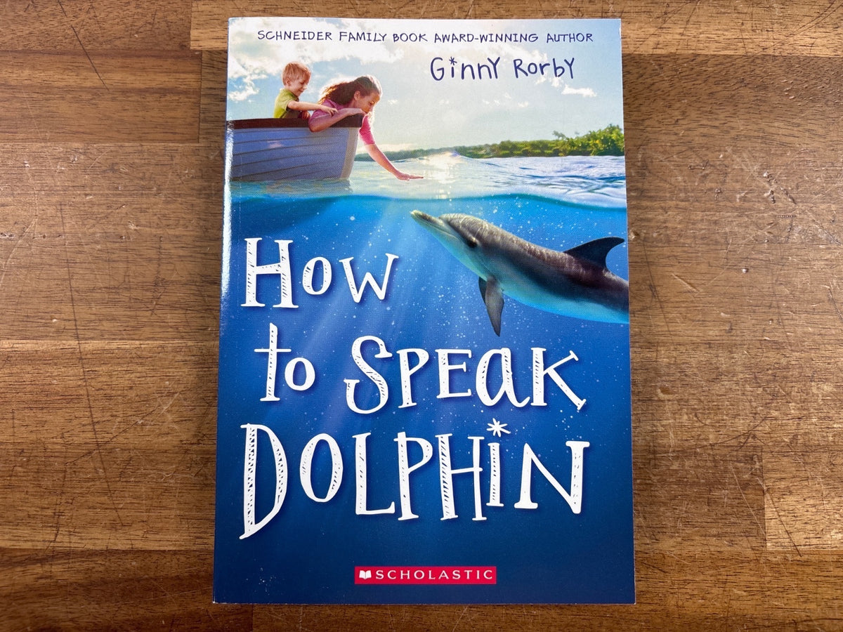 How to Speak Dolphin by Ginny Rorby - Scholastic Paperback — front cover