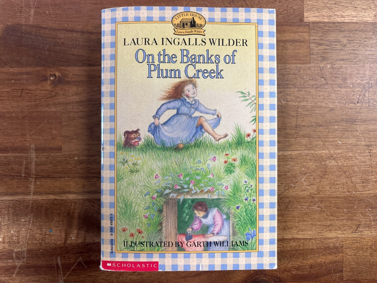 On the Banks of Plum Creek by Laura Ingalls Wilder PB