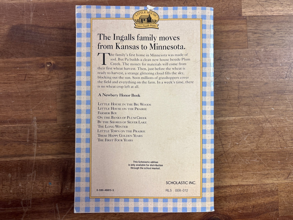 On the Banks of Plum Creek by Laura Ingalls Wilder PB