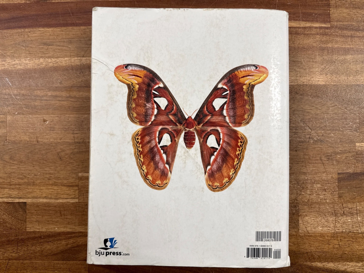 BJU Press Biology Fourth Edition Student Textbook — Acceptable — Cover shows heavy edge and corner wear; interior pages contain some highlighting but no writing.