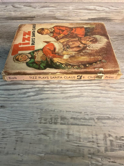 Tizz Plays Santa Claus by Elisa Bialk